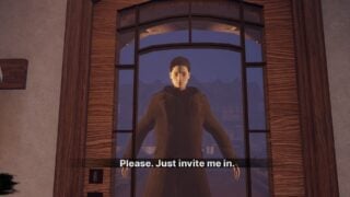 Screenshot from Home Alone Anomaly, showing a visitor that resembles a pale man with slicked back black hair, wearing a black trench coat.