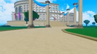 A Blox Fruits screenshot of the new Colosseum area. It shows a building that resembles the Roman Colosseum, including the missing chunks of wall. Colored banners hand from the top of the first tier. 